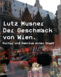 Farbphotographie: Auslage des Manner-Ladens, im Schaufenster spiegelt sich der Stephansdom